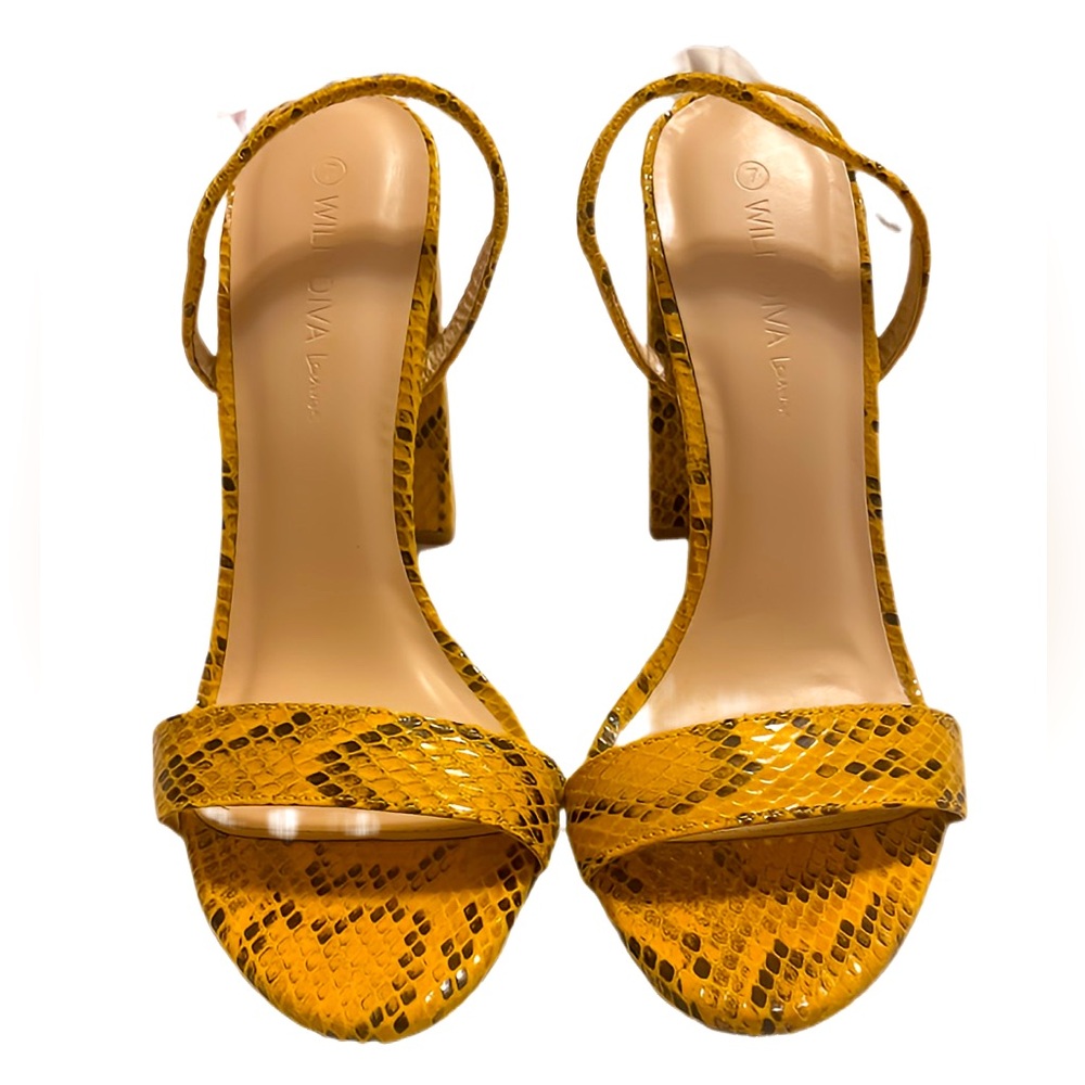 Yellow and black snake skin heels